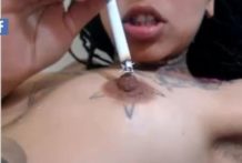 Tatted se quema los pezones con el cigarrillo